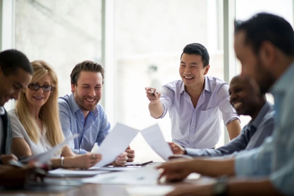 Smiling man in a meeting
