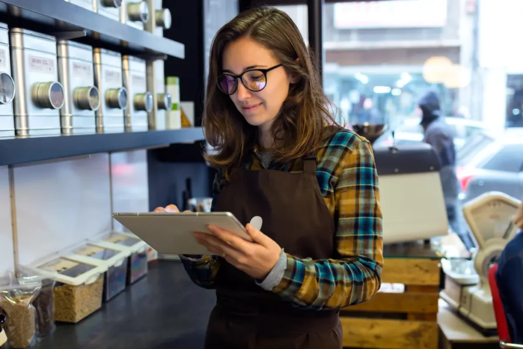 A woman staff browsing on her tablet. 