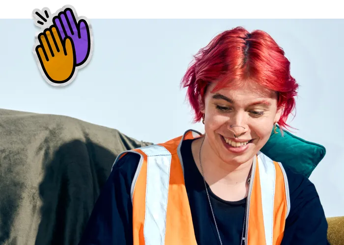 Smiling worker in safety vest