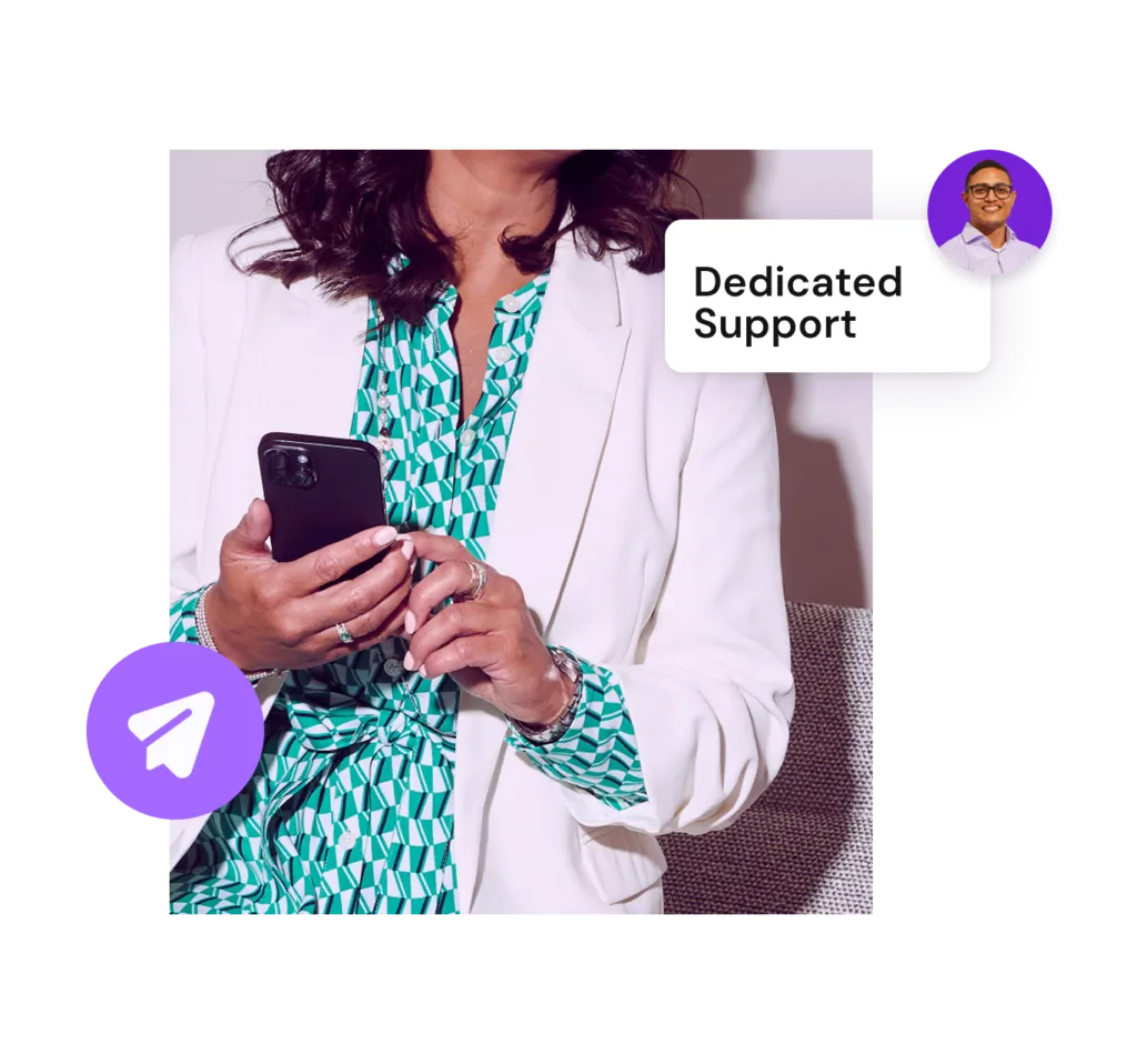 Person in white blazer holding phone with support icon and “Dedicated Support” label