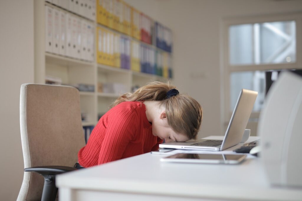 woman sleeping at work