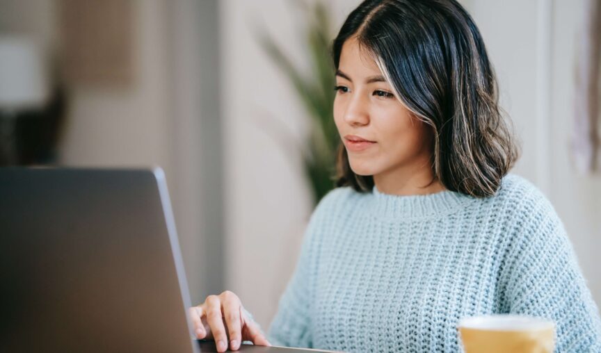 woman working on her laptop remotely