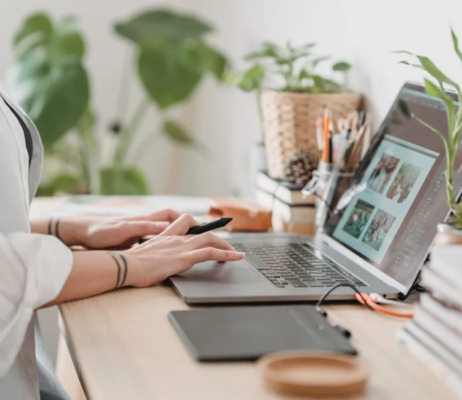 woman using her laptop at a desk