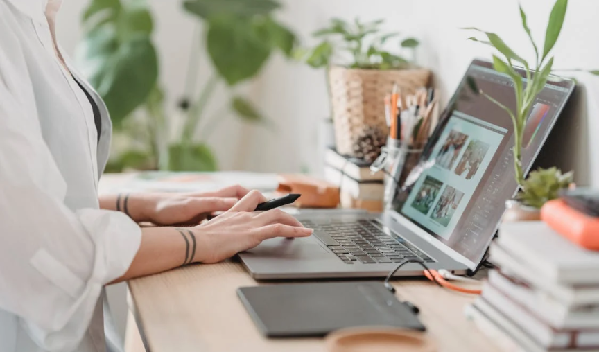 woman using her laptop at a desk