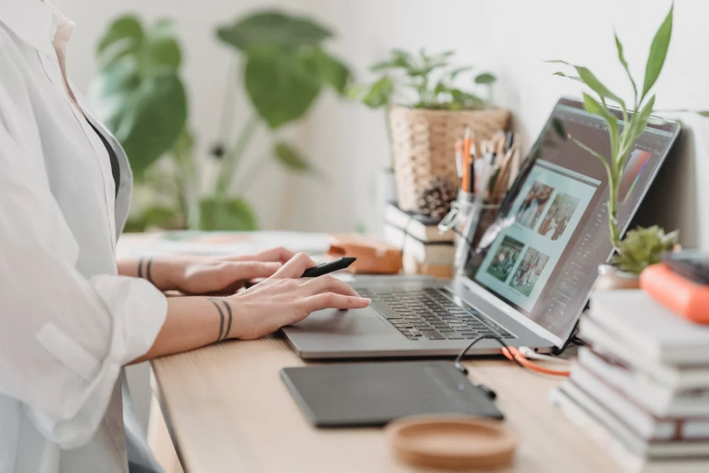 woman using her laptop at a desk