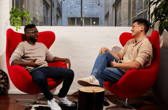 Two colleagues having a one on one meeting