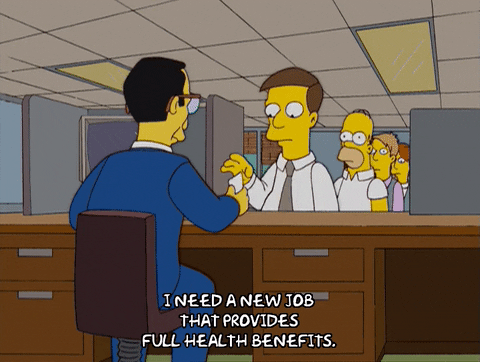 Homer simpson walks up to a counter, saying 'I need a job that provides all health benefits"