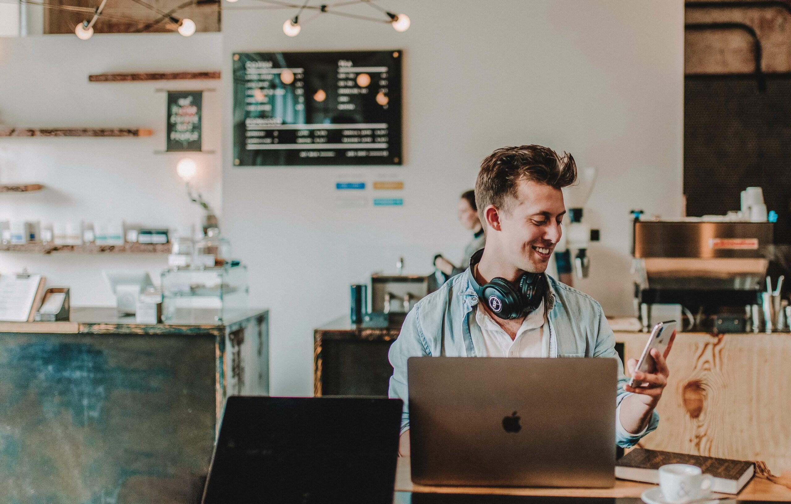 man working at a coffee shop
