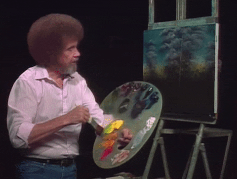 Bob Ross is painting on an easel