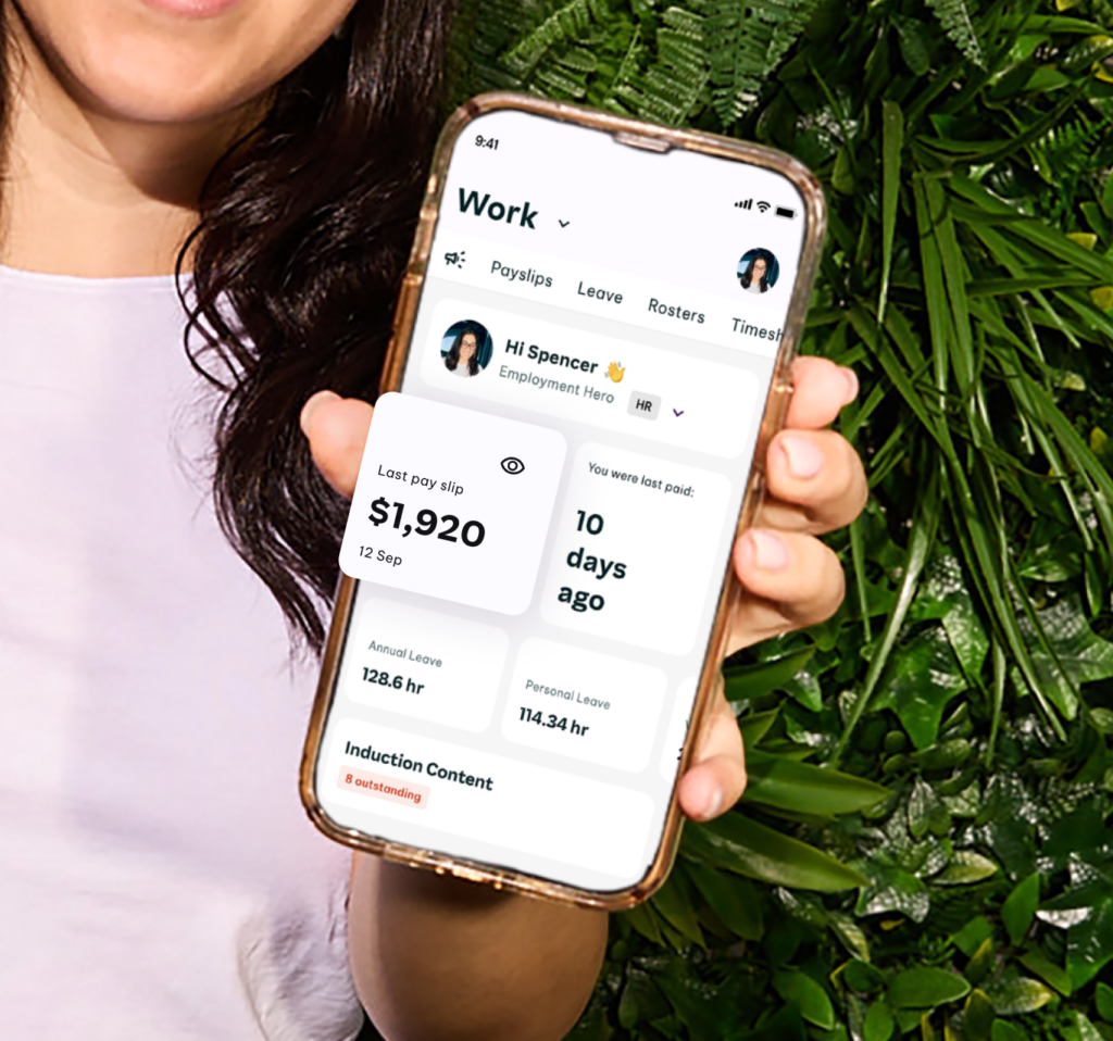 Person holding phone displaying a work app dashboard with last pay info, hours worked, and days since last payday