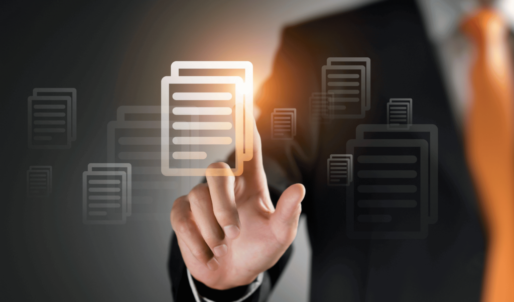 Businessman in a suit touching a virtual document icon on a digital interface