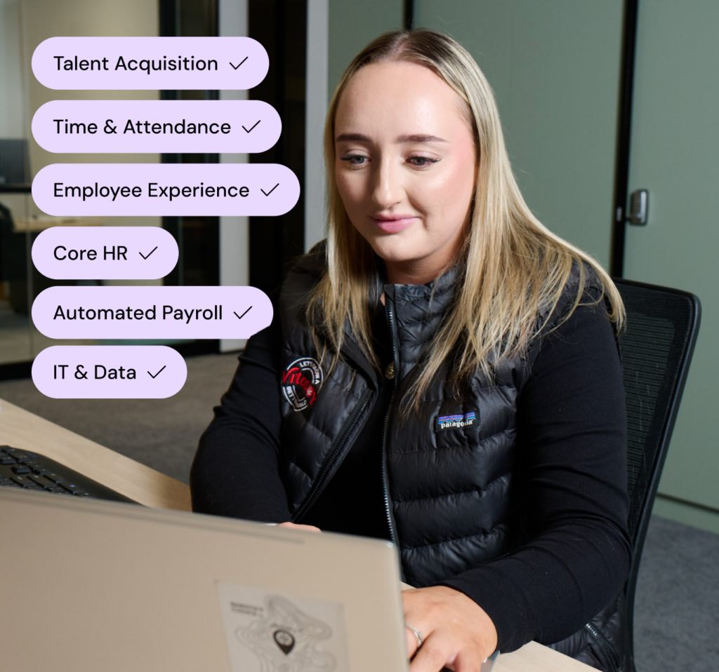 Woman working at a laptop with a checklist of HR features like Talent Acquisition, Core HR, and Automated Payroll.
