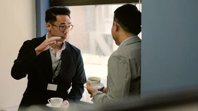 Two men discussing about office work