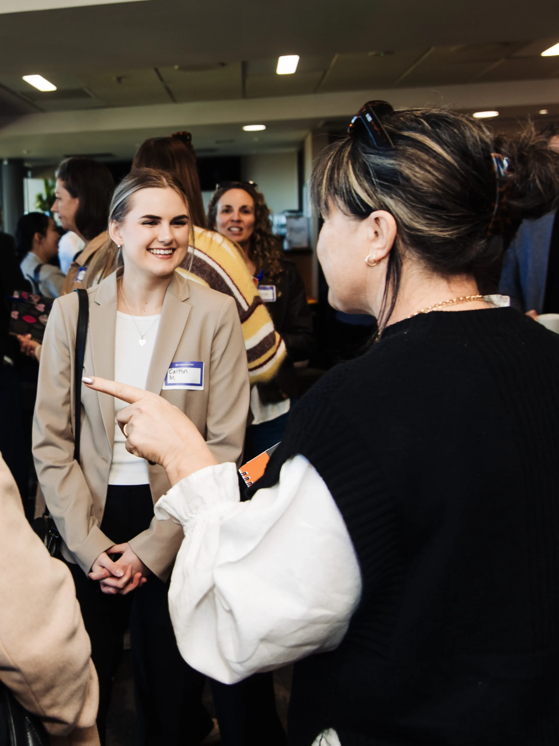 Women talking in a convention