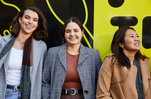 three women smiling