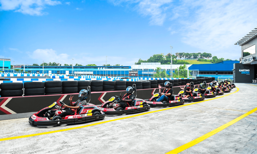 Team doing go-karting at the Karting Arena