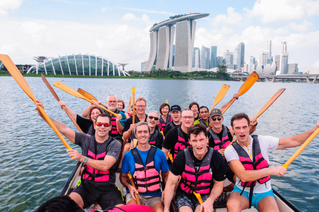 Team doing dragon boating in the Kallang River/Marina Bay