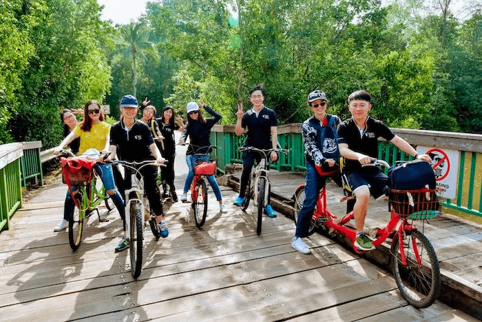Team riding bikes at Pulau Ubin