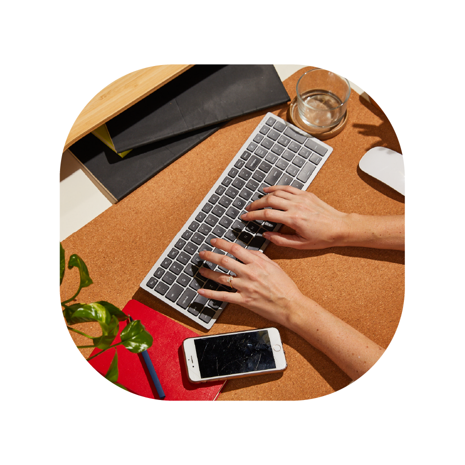An image of hands typing on the keyboard
