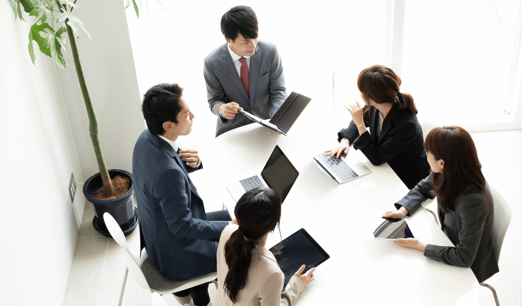a group of colleagues working together at a table