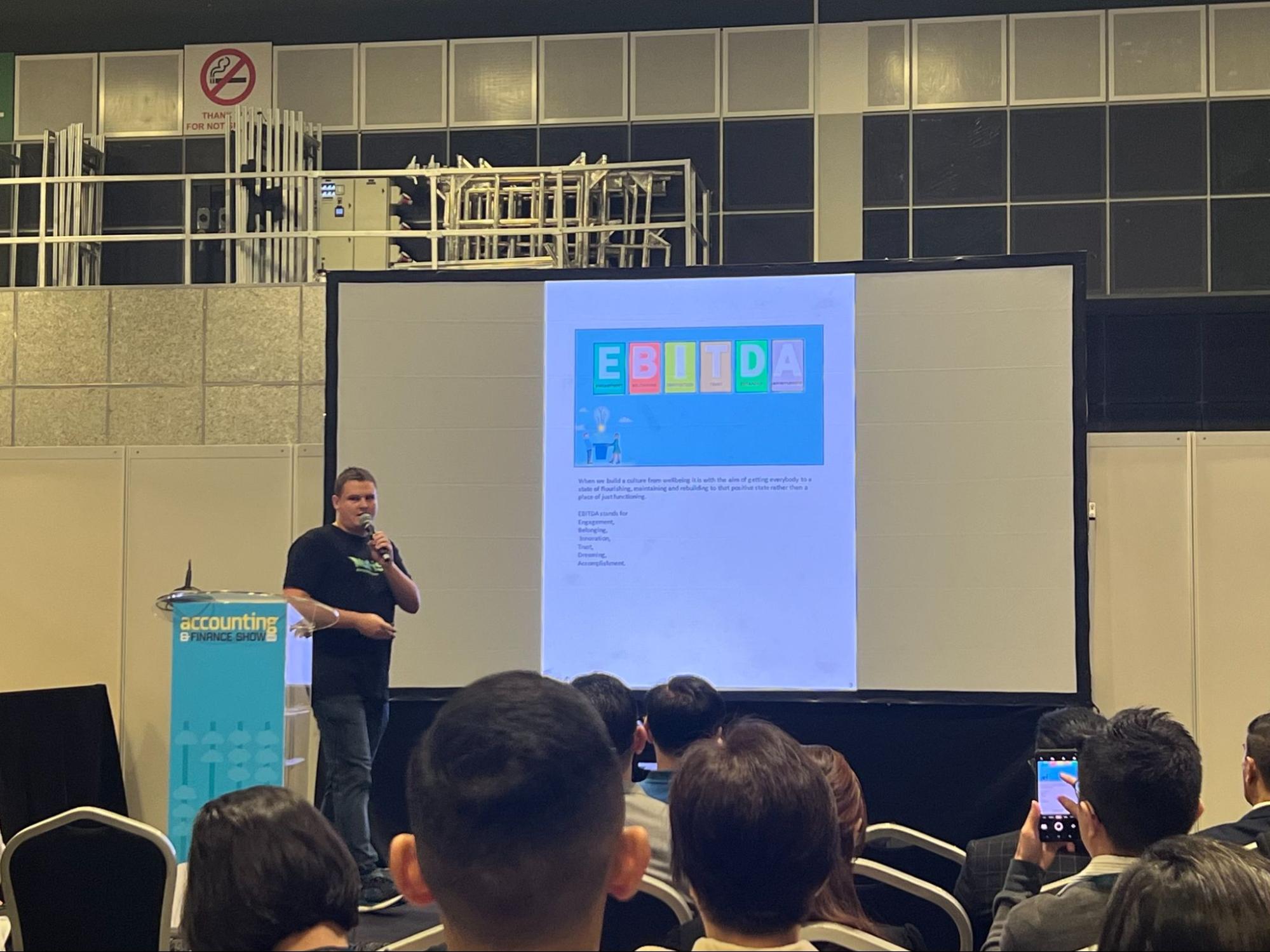 Zac Hayes giving a presentation at the accounting and finance show