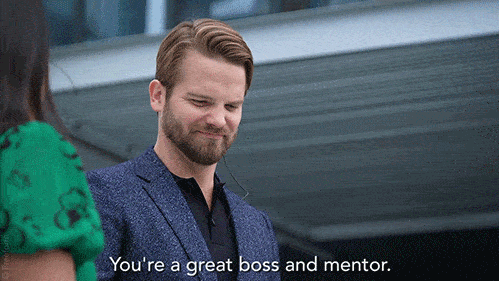 employee showering her boss with flattery