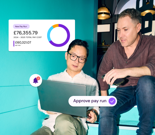 Two men looking at a laptop displaying a "New Pay Run" dashboard with financial figures and a pie chart. One man has a notification icon above his head and a speech bubble reading "Approve pay run".