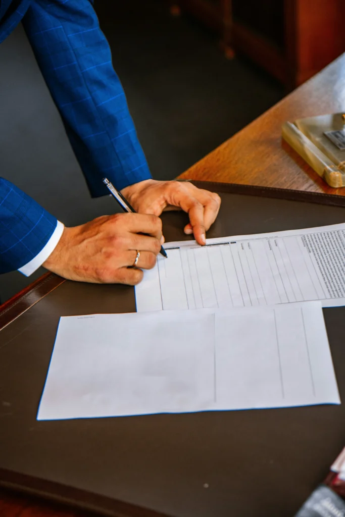 Man signing documents