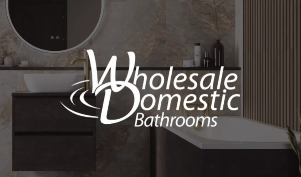 Modern bathroom with dark wood cabinets, a white vessel sink, and a bathtub. Elegant decor includes stone tiles and a sleek faucet. Text overlay: "Wholesale Domestic Bathrooms."