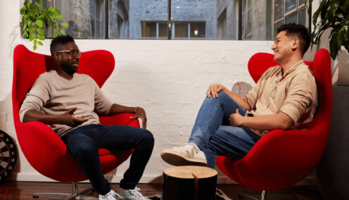 Two male colleagues having a one on one meeting