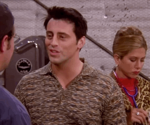 A man talking to another man saying "You have got to listen" mockingly. There's a woman beside him smiling awkwardly playing with a stethoscope.