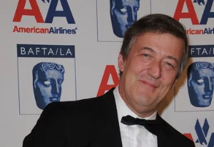 Stephen Fry wearing a tuxedo