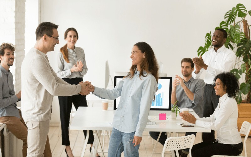 Group of coworkers celebrating wins