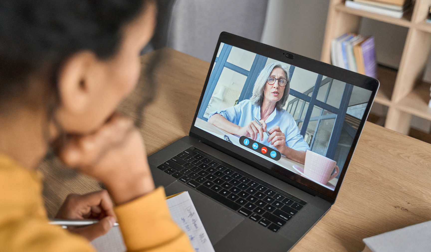 Employee speaking to her manager over Zoom