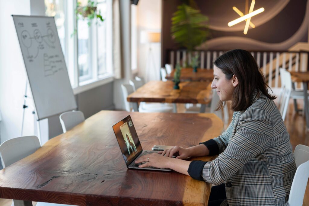 woman in an interview on her laptop