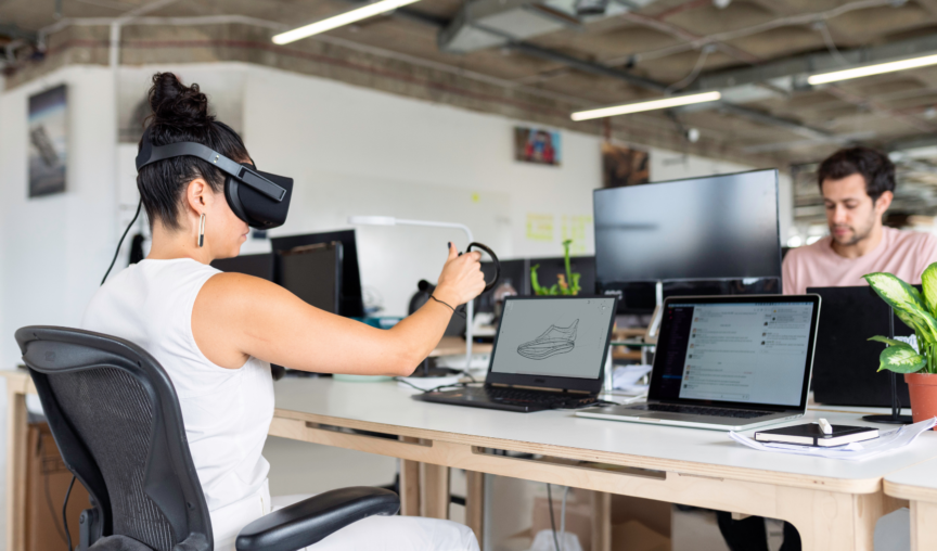 woman using a VR headset at work