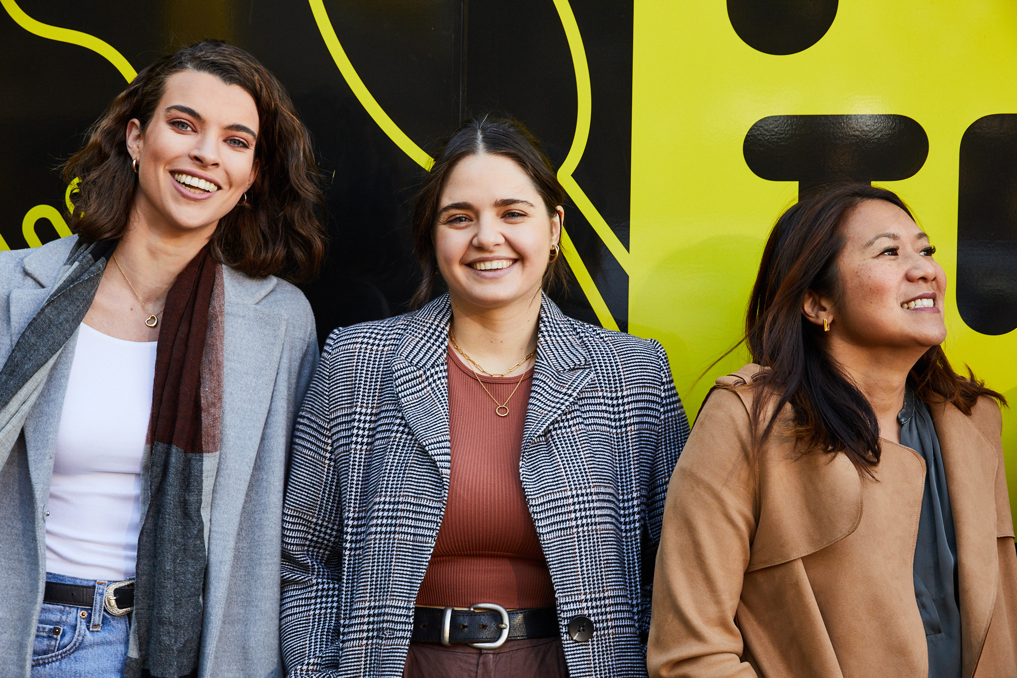three women smiling