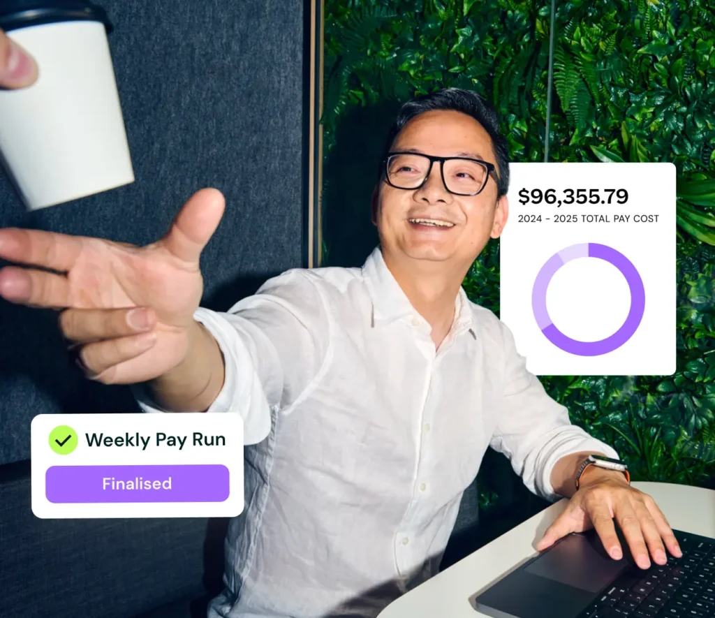 A man receives a coffee cup while smiling at a desk; payroll data and a finalized pay run are shown on-screen.