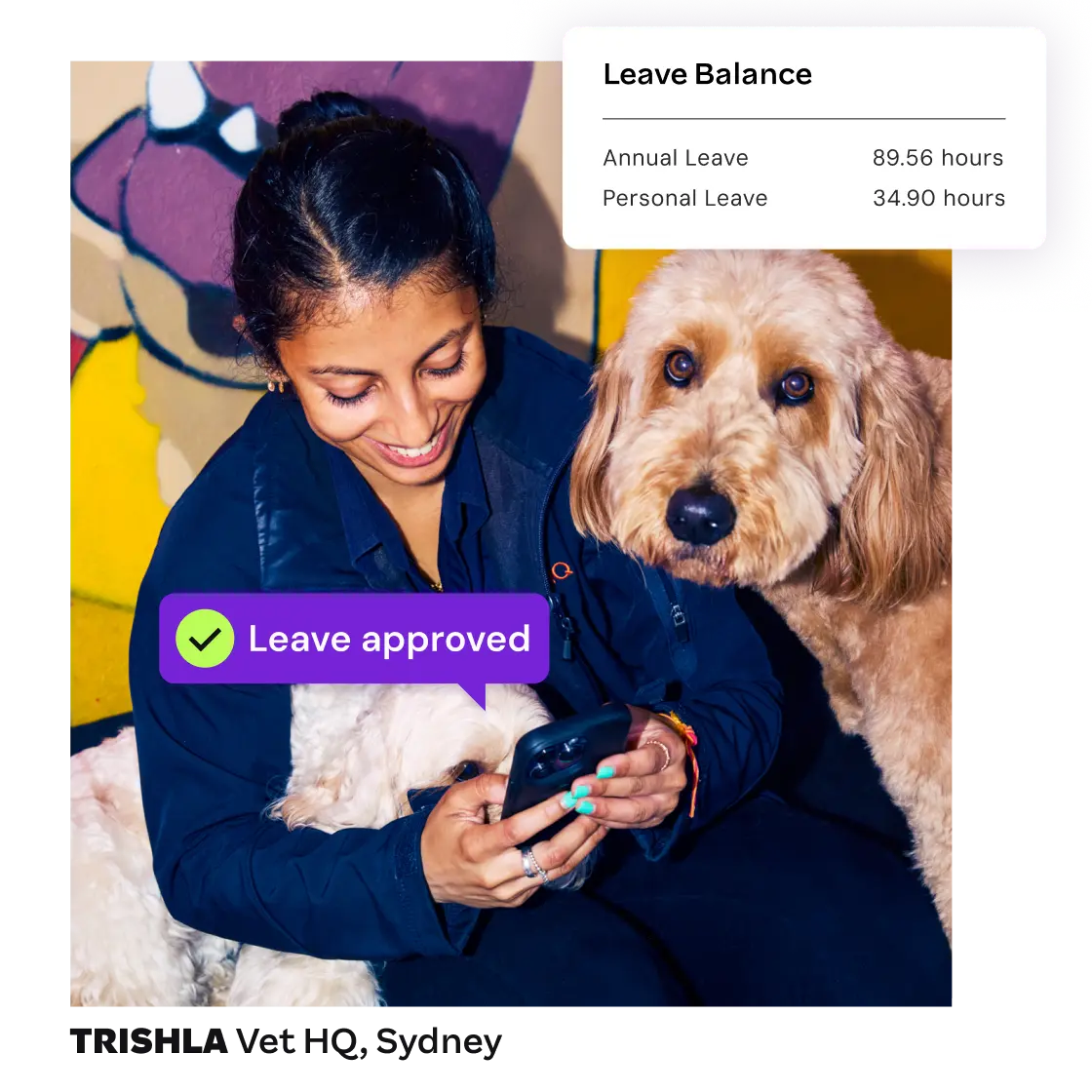 A smiling woman sits with two dogs while checking her phone, displaying a leave approval and her available annual and personal leave hours.